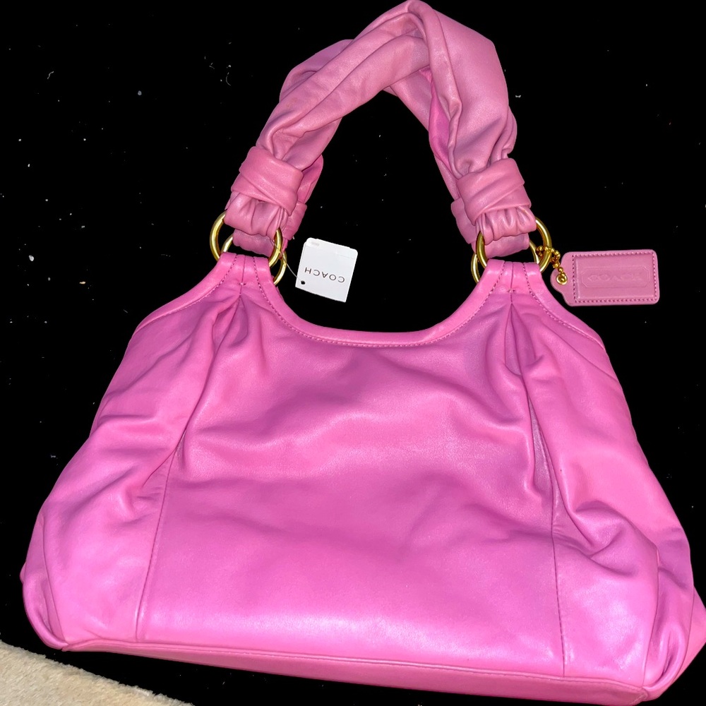 Women’s mauve Coach handle bag